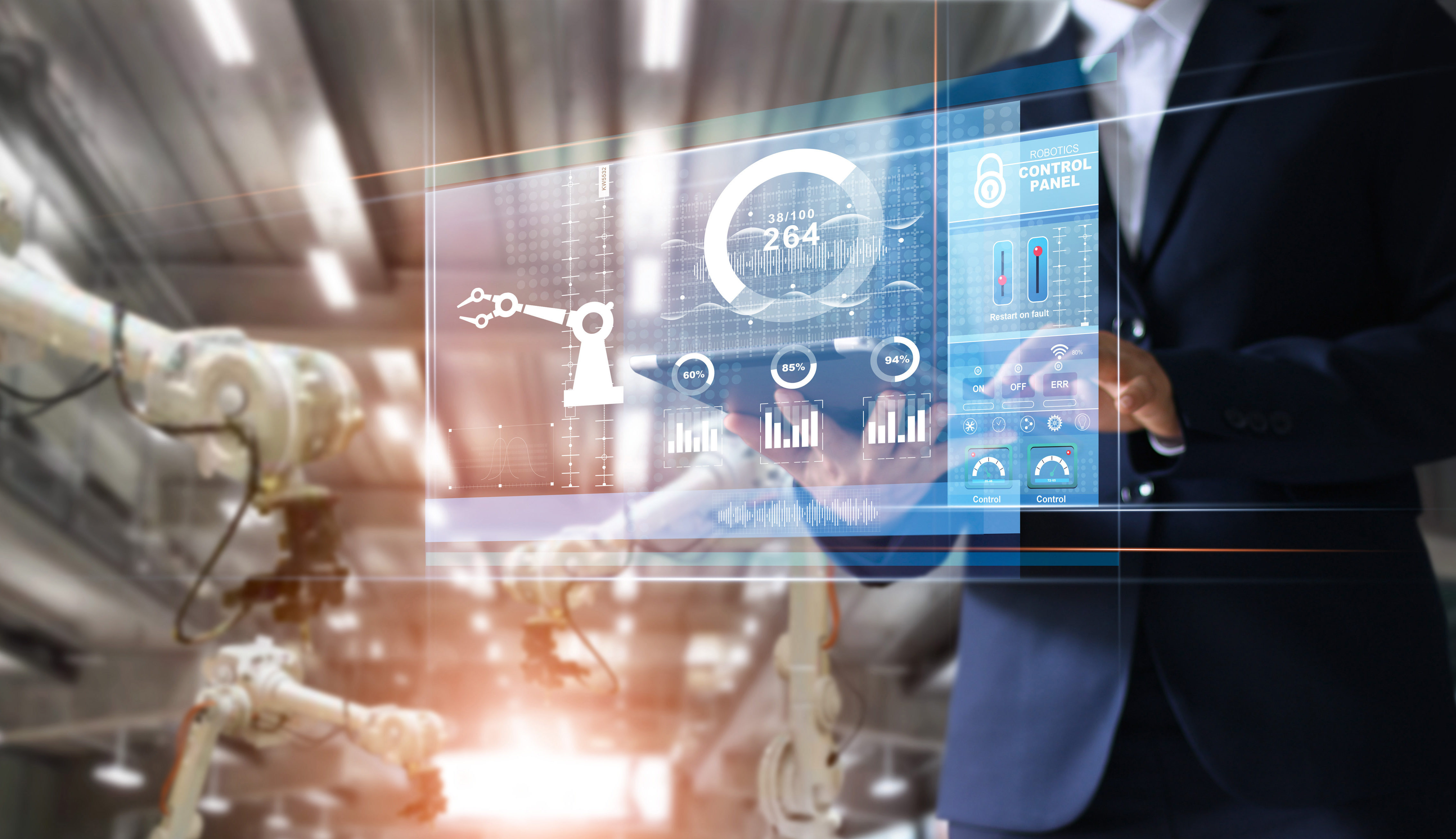 Robotics engineer manager using tablet check and control automation robot arms machine in intelligent factory industrial over system on virtual interface screen, Industry 4.0 concept